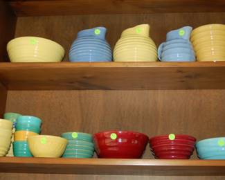 Colorful ribbed pottery collection, including Meyers California Rainbow
