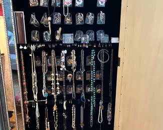 Behind a LARGE mirrored frame