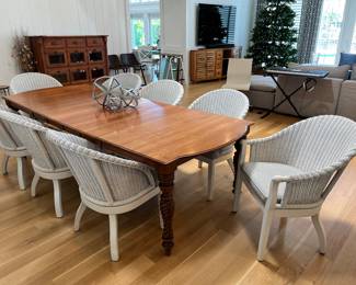 Made by Richardson Brothers. 
Table with 4 leaves and 8 arm chairs. 