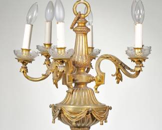 ANTIQUE DORE BRONZE CHANDELIER | Having six lights, finely cast with fluting, acanthus leaves, garland drapery and ropework, cut glass bobeches. Concealed wiring - h. 18 x dia. 18 in.

