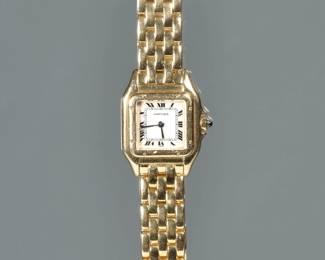 A LADIES PANTHERE DE CARTIER 18K GOLD WRISTWATCH | White dial with Roman numerals, stylized rectangular border, sapphire crown, on a matching 18k gold five-row maillon panthere link bracelet, quartz movement, case s/n 8669117595, case and bracelet signed "Carter" and impressed with swiss hallmarks. 67.8g total weight
 - l. 7 in. (approx)