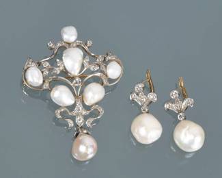 (3pc) ANTIQUE NATURAL PEARL & DIAMOND DEMI PARURE | Comprising a shield-form brooch with open scrollwork mounting six baroque pearls and melee diamonds set in 18k gold (marked 18k) and suspending one bead cultured pearl (2 in., 14.4 g) ; plus a pair of matching fleur-de-lis earrings suspending large pearls (12.5 mm and 12.1mm, together 7.6 g) Accompanied by GIA Report No. 6237088489 describing three of the pearls on the brooch as Semi-baroque, White, Variously Colored Overtones, Natural Freshwater, Unionidae species; the drop pearl tested as cultured.
