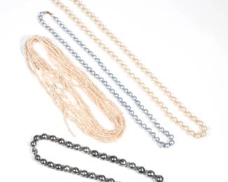 (4pc) MISC. PEARL NECKLACES | Including a strand of knotted off-white pearls (9.8mm, 30 in.); a strand of blue baroque pearls with a 14k gold clasp (9mm, 24 in.); a strand of large south sea pearls (9-12.5mm, 17 in.); and assembled strands of small champagne pearls