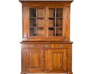 CENTURY FURNITURE BOOKCASE / CUPBOARD | 20th century, having double glazed doors over three drawers, over double cabinet doors, with beautifully hammered iron decorative hinges
l. 57 x w. 19 x h. 82 in.