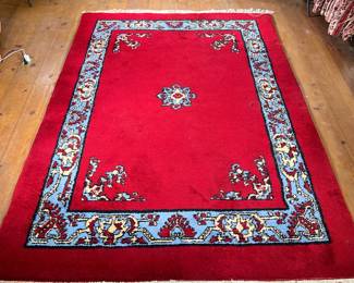RED VINTAGE MOROCCAN RUG | Deep red color with a cerulean blue inner border. Tag reads "Morocco."
 - l. 106 x w. 74 in.
