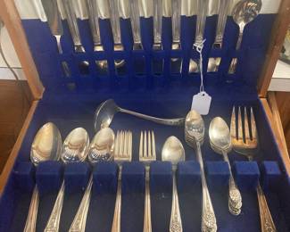 Silverplate - Service for eight - includes iced tea spoons and extra serving pieces.