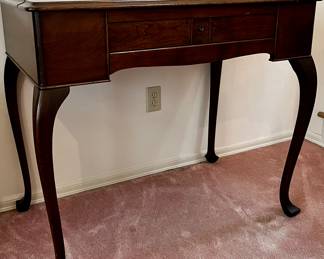 Antique desk opens to desk with pull out sides