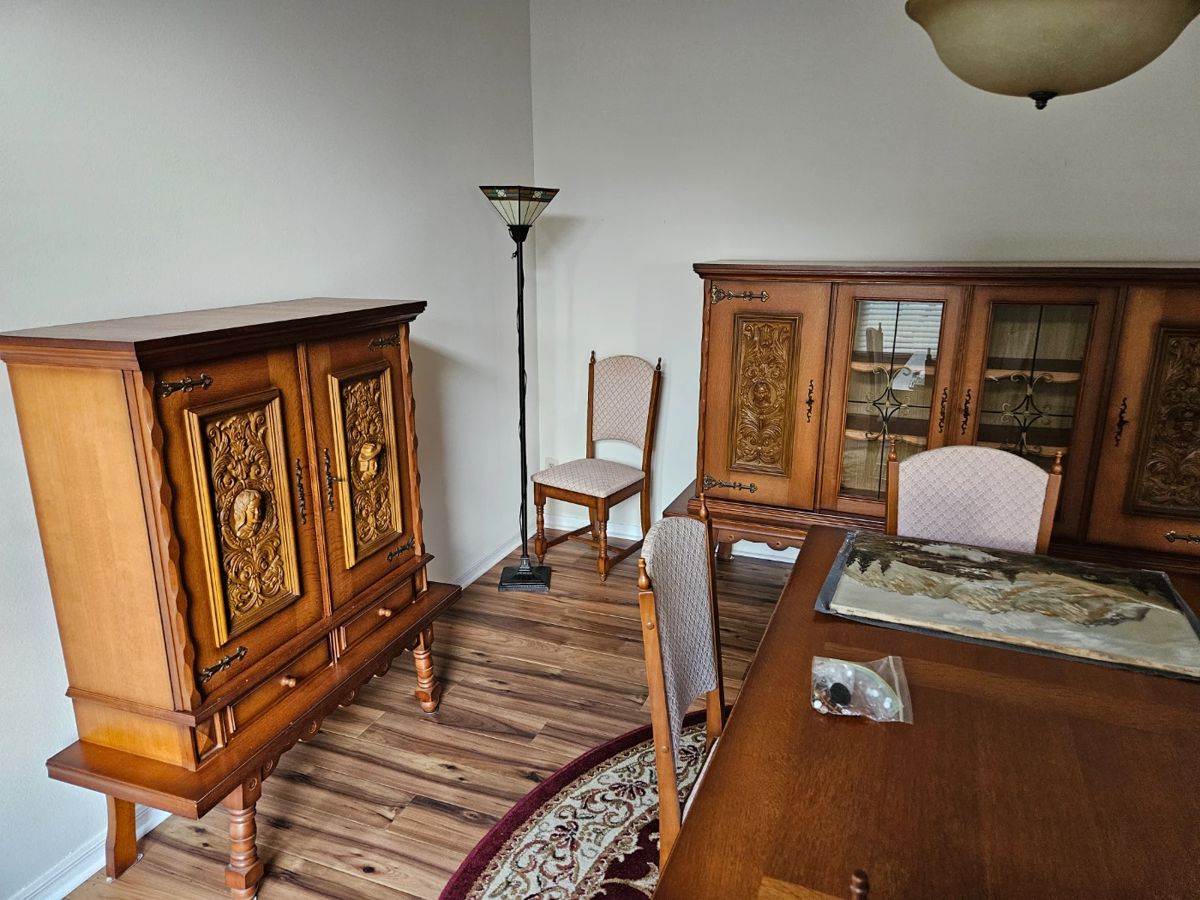 German "Shrunk" antique Dining set. The 2 cabinets are the nicest ive seen in awhile. Absolutely  stunning. $3,000  for both cabinets and the dining table  with 4 chairs. 
