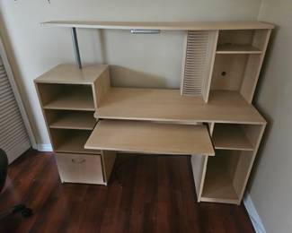 This student desk Priced to sell 
$25.00, the even an  LED light underneath the top shelf for easy reading " for those bookworms" that don't want to bother their roommates at college