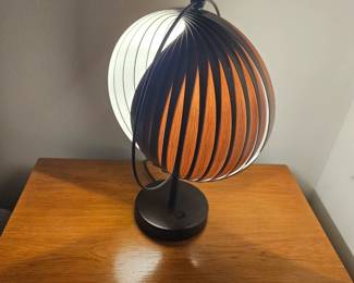 Very interesting lamp, the collapsible lamp shade can make the room as full of light as you want OR as dim as you like
$30.00