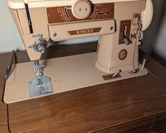 Singer sewing machine with cabinet
