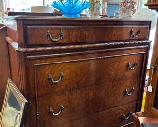 Notice the blue stretched glass epergne and the two vanity lamps