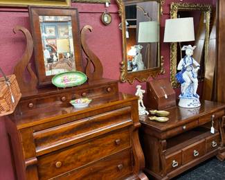 This is still one of my favorite pieces of furniture.  Scaritt and Mason Mahogany Gentlemens step back Dresser. Empire Style with beveled swing mirror.  Look at the "S" Shaped brackets