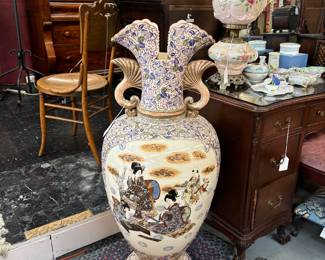Incredible Japanese  Vase approximagely 4.5 tall.  Scenes depicted on all sides, top and base.  Excellent condition.