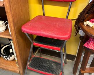 Vintage Cosco Stool.  Seat lifts up to make step ladder