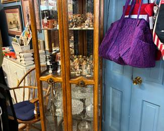Love this curio cabinet with 2 doors and light.  Glass Shelves with mirror