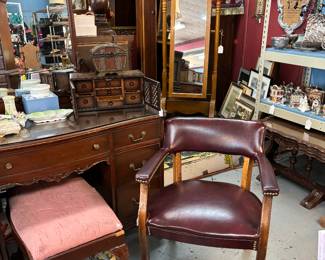 We have 4 of these burgundy leather chairs