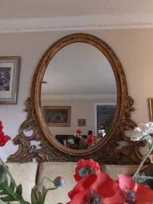 Ornate Antique oval mirror 5’ tall