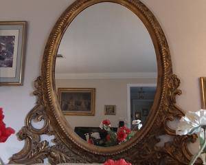 Ornate Antique oval mirror 5’ tall