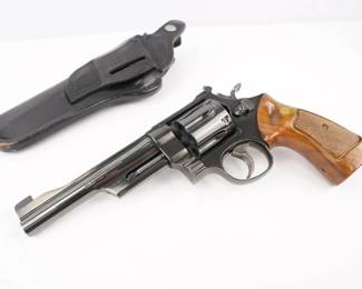 Make: Smith & Wesson
Model: 27-2
Caliber: .357 Magnum
Action: DA
Barrel: 6
Bore: Shiny
Serial # 275086
Condition: Excellent
This smith and Wesson 27-2 is one of the finest N frames made. The model 27 was made from 1958 until the present. It has been made in at least 6 barrel lengths and 2 finishes. Featuring a 6 inch barrel chambered in 357 Magnum. This revolver comes with a holster and is in excellent condition showing normal signs of use and wear.