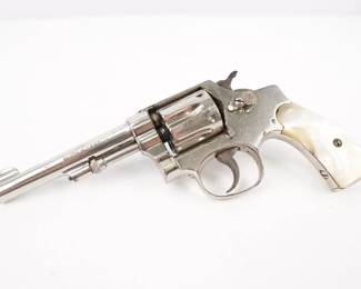 Make: SMITH & WESSON
Model: NVM
Caliber: 32 LONG CTG
Action: DA
Barrel: 4.25
Bore: Frosty
Serial # 300974
Condition: Good
Smith & Wesson hand ejector 32 S&W long. This nickel plated frame. Manufactured between 1917 and 1942. It is a smaller version of the M&P in a liter cartridge. This Revolver is in Good condition showing normal signs of use and wear. Please see the photos.