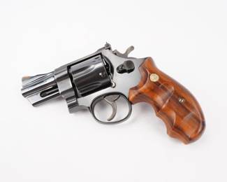 Make: Smith & Wesson
Model: 24-3
Caliber: 44 S&W SPL
Action: DA
Barrel: 2.75
Bore: Shiny
Serial # AEJ2256
Condition: Excellent
A scarce PRE Lew Horton model 24-3 Smith & Wesson wearing a three inch barrel and finger groove Lew Horton Combat grips. Chambered in venerable .44 special cartridge with six in the cylinder. Factory Black finish.