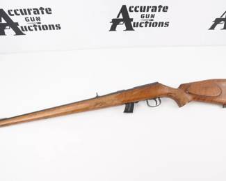 Make: J.G. Anschutz GmbH Ulm
Model: 1418
Caliber: 22 LR
Action: Bolt
Barrel: 19.75
Bore: Bright
Serial # 1224308
Condition: Very Good
This is a famous Anschutz Sporting Rifle Chambered in 22LR with a Mannlicher Stock with some scratches. Stamped West-Germany which indicates prior in 1989. This 22 long rifle sports a 19.75 inch barrel with a magazine with 10 round capacity. This Rifle is in very Good condition showing signs of use and wear/Missing a screw in the stock..