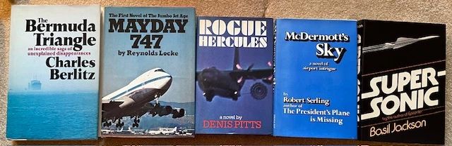Aviation books, starting at $10 per lot.