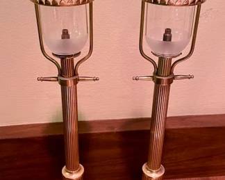 Miniature brass lampposts from the Orient Express. We have a pair of sconces from the Orient Express available as well.