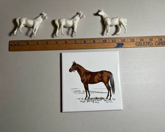 3 Ceramic Horse Figurines And A Horse Designed Trivet
