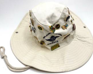 Over 30 Collectible Pins From Australian Travels On Vintage White Bucket Sunhat 2004
Lot #: 60
