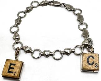 Sterling Silver Scrabble Charm Bracelet (C, E) & Sterling Silver Scrabble Cuff Links (E,H) Scrabble Pouch
Lot #: 79