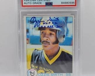 1979 TOPPS OZZIE SMITH SIGNED ROOKIE CARD. PSA 10
AUTOGRAPH WITH TWO INSCRIPTIONS! ONE OF A KIND ULTRA RARE OZZIE ROOKIE CARD.