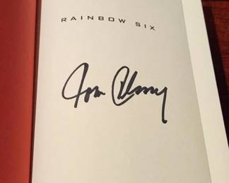 TOM CLANCY SIGNED FIRST EDITINO RAINBOW SIX BOOK.