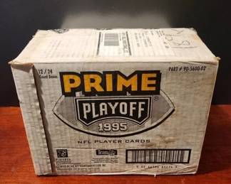 1995 PRIME PLAYOFF NFL CASE OF SEALED BOXES. 12 SEALED BOXES IN FACTORY CASE BOX. VERY RARE ITEM