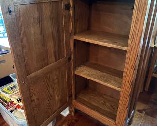 Tall oak storage cabinet