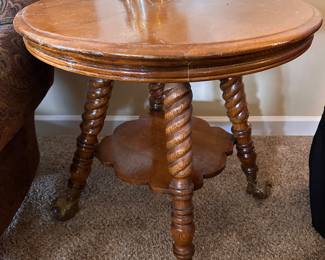Vintage clawfoot round wooden table