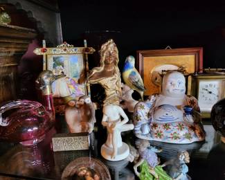 many Decorative Arts items , that is a Delft Buddha.