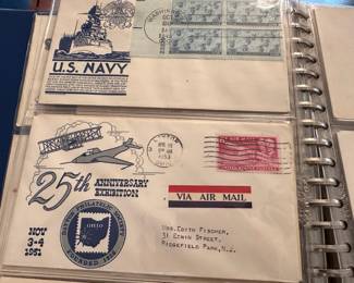 Airmail and first day covers in two blue binders