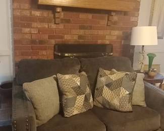 Matching loveseat in set. Set includes: couch, loveseat, chair and ottoman. Priced per piece. 