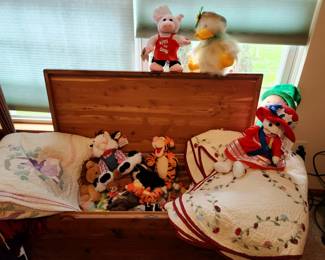Traditionally cedar chest. Filled with cute animals and quilts. 