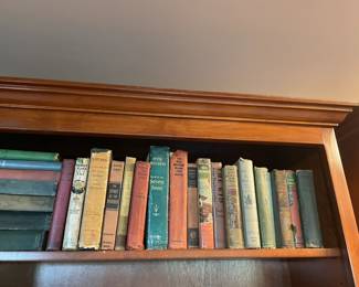 Vintage books and wooden bookshelves.