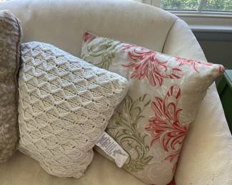Large selection of decorative pillows.