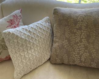 Large selection of decorative pillows.