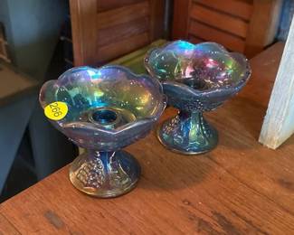 TWO CARNIVAL GLASS CANDLE STICK HOLDERS