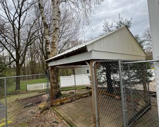 Dog kennel is 4 10x10 panels 6ft tall with a steel roof. Plus an additional 36 ft of 6 ft tall fencing with all posts, top rail, and bottom rails.
Picture 1 of 3