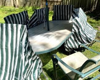 Tropitone industrial table and chairs with covers