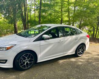 2015 White Ford Focus - 14,000 miles