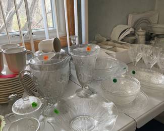 Iris herringbone pattern pieces, pfaltzgraff dishes, fancy wine glasses 