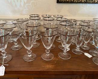 Large set of crystal stemware with a silver rim - priced by the size
